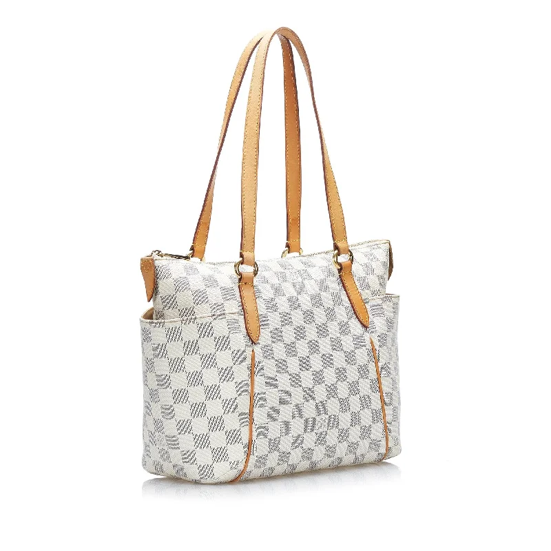 Ladies Louis Vuitton Petite Malle bags in a pastel color for a soft lookLouis Vuitton Damier Azur Totally PM (uTMO4x)