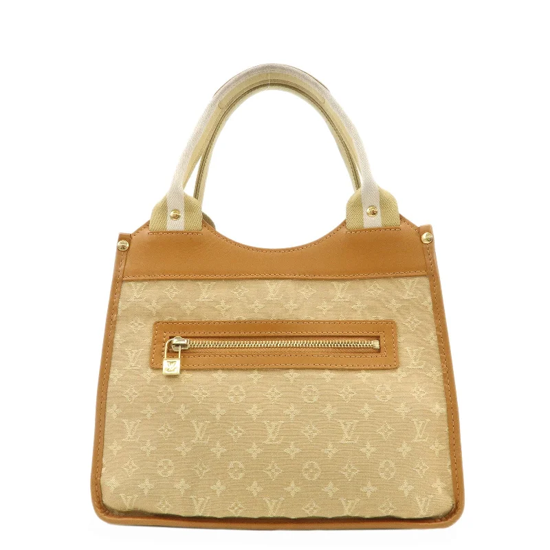 Louis Vuitton Twist bags with a contrast - colored interior for visual interestLouis Vuitton Monogram Mini Sac Catherine Hand Bag Beige M92328