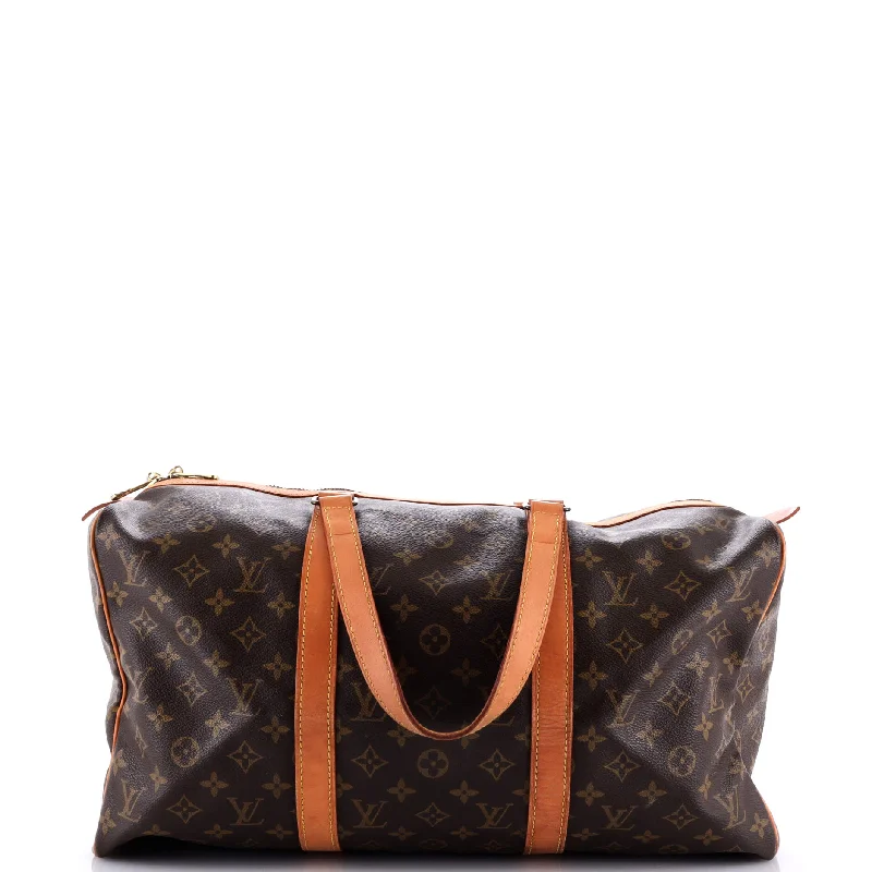 Louis Vuitton bags with a snap - button closure and a decorative charm for styleSac Souple Handbag Monogram Canvas 45