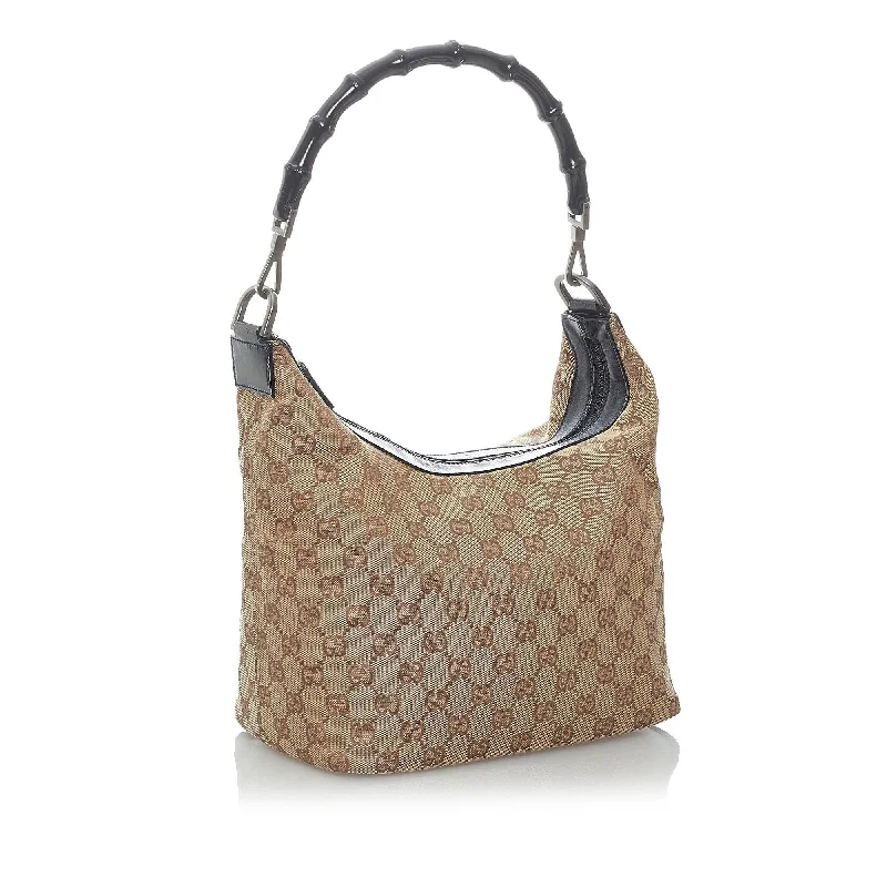 Women Gucci bags with interlocking G hardware for a classic lookGucci GG Canvas Shoulder Bag (30441)