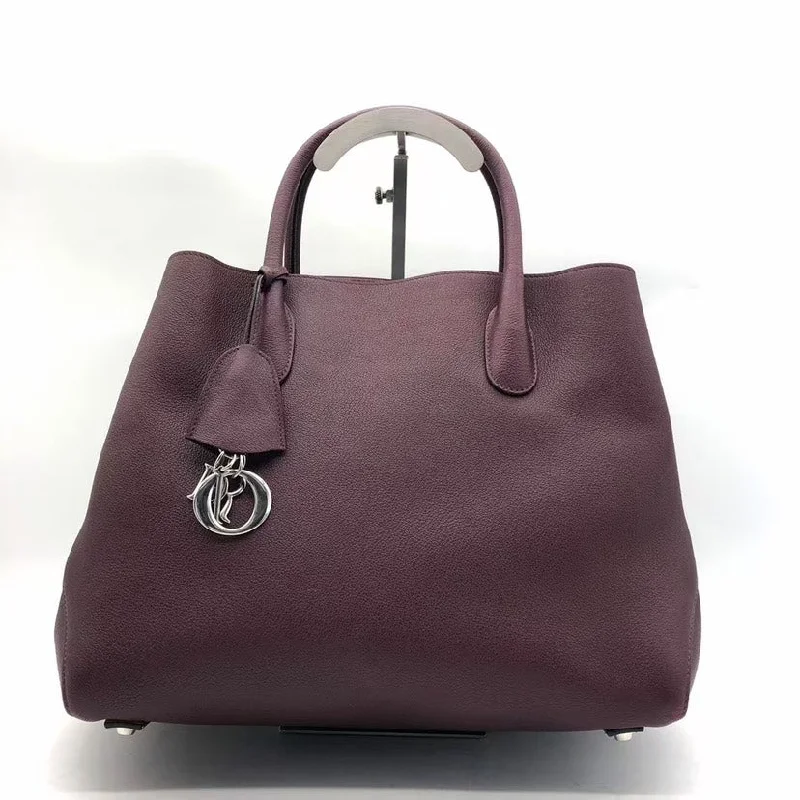 Christian Dior Saddle bags with a patent leather finish for a shiny lookDior Burgundy Leather Tote Bag Medium