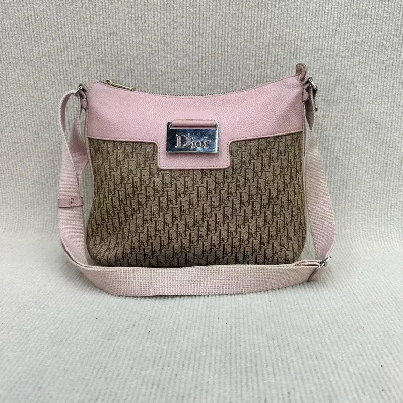 Christian Dior Saddle bags with a studded trim for a bold lookDior Pink Monogram Canvas Shoulder Bag Medium